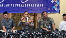 Jumat Berkah, Polisi Bagikan Sembako di Kelurahan Kemayoran Bangkalan Sekaligus Himbau Kamtibcarlantas